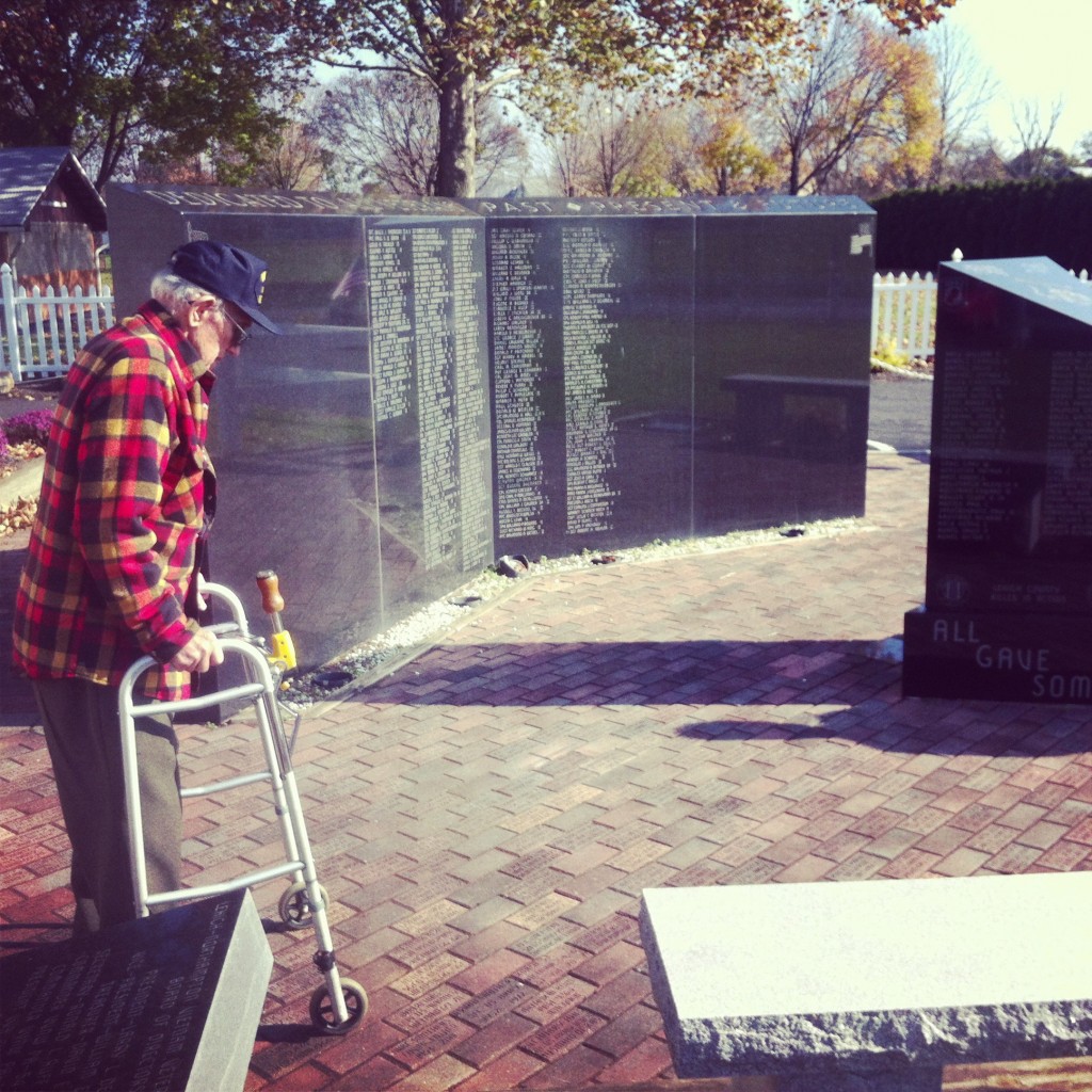 Arthur Kern of Allentown. Served in World War II looks at his service brick at Macungie VFW Post 9264